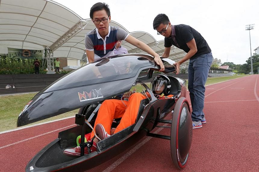 The NTU Venture 8 (above) and NTU Venture 9 (left), two eco-cars designed and built by students from NTU's College of Engineering. The cars will be competing in the latest edition of the Shell Eco- marathon Asia in Manila at month's end.