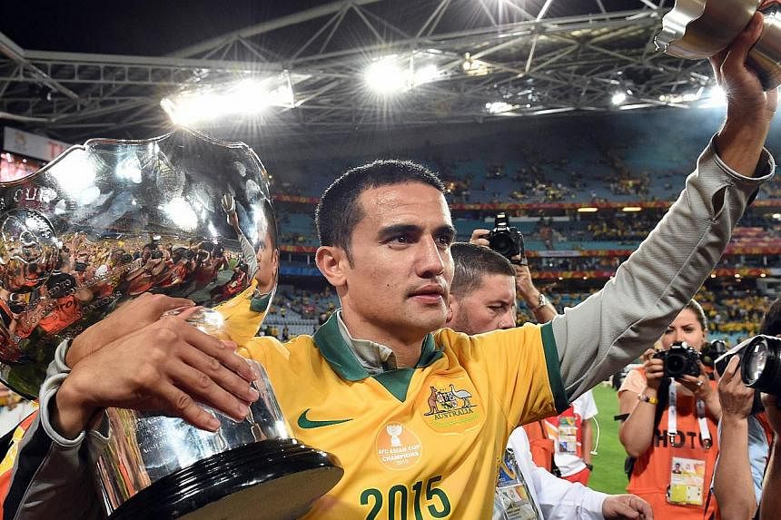 Australia's Tim Cahill celebrating after beating South Korea in the AFC Asian Cup football final at Stadium Australia in Sydney on Jan 31, 2015. -- PHOTO: AFP
