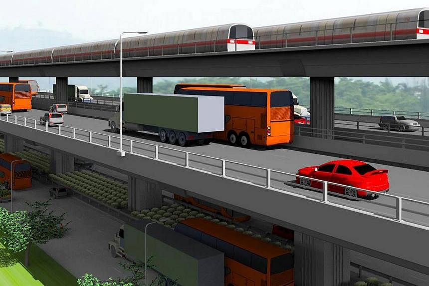 An artist's impression of the Tuas West Extension, which goes over the Ayer Rajah Expressway viaduct. -- PHOTO: LTA