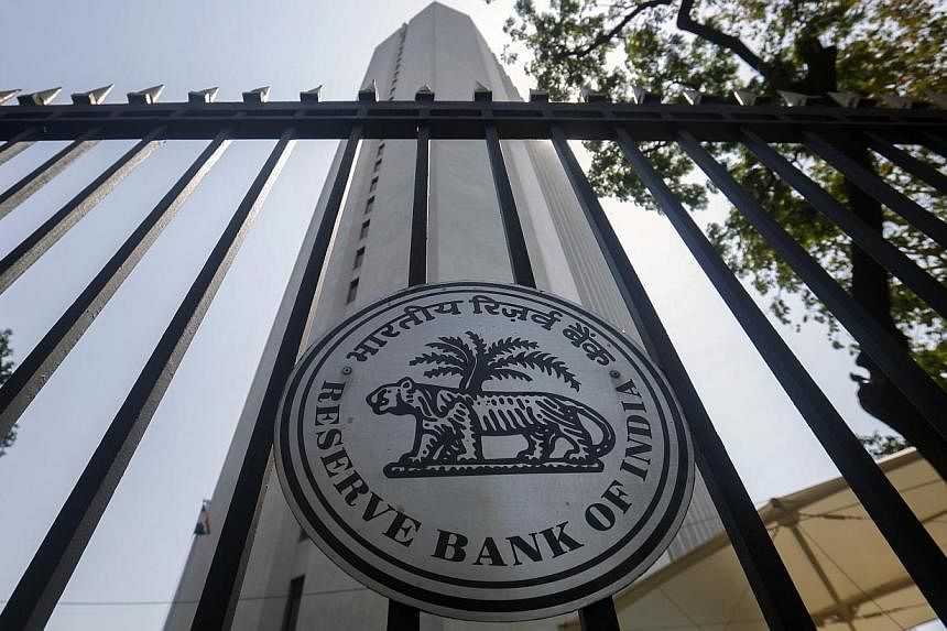 The Reserve Bank of India cut the statutory liquidity ratio (SLR) - or the amount of bonds that lenders must set aside - by 50 basis points to 21.5 per cent of deposits from the two-week cycle starting on Feb 7 in a bid to spur banks to inject more c
