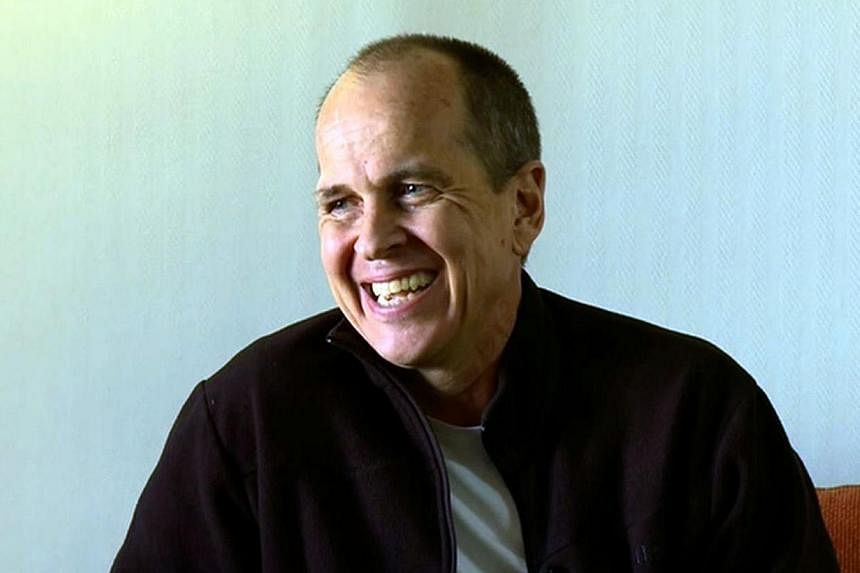 An image grab taken from an exclusive Al-Jazeera English interview broadcast yesterday shows Australian journalist Peter Greste in his first media appearance since leaving an Egyptian prison. -- PHOTO: AFP