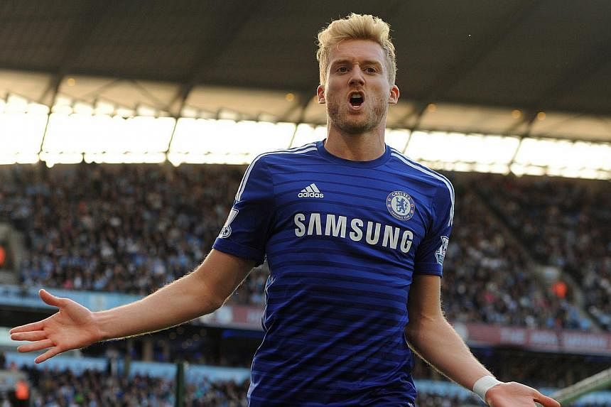 VfL Wolfsburg signed Germany's World Cup-winning forward Andre Schuerrle from Chelsea on a four-and-a-half year contract on Monday. -- PHOTO: EPA