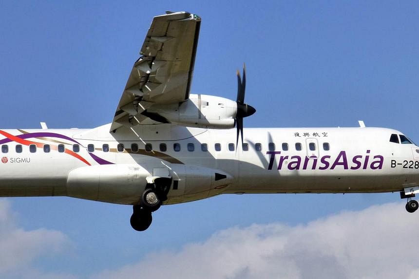A photograph made available on Feb 4, 2015, shows an ATR 72 mid-range, twin-engined turboprop passenger plane of TransAsia Airways taking off from the Taipei Sungshan Airport in Taipei, Taiwan on Dec 6, 2014.&nbsp;A TransAsia Airways plane crashed in