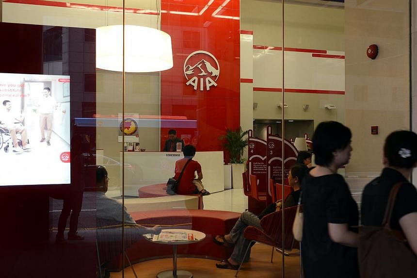 AIA Group, Prudential and Manulife Financial Corp are among firms shortlisted to become the insurance partner of Singapore's DBS in a bank distribution deal worth around US$1.5 billion (S$2 billion), people familiar with the matter said. -- PHOTO: ST