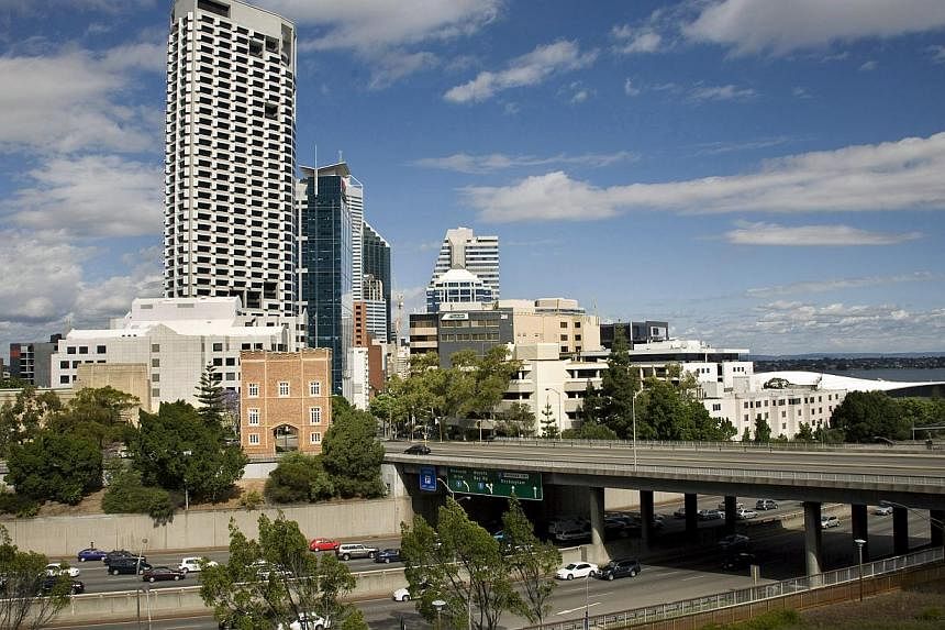 Downtown Perth in 2008. Mainboard-listed developer Sim Lian announced on Wednesday that it is acquiring an office complex in the Australian city for A$72.8 million (S$76 million). -- PHOTO: BLOOMBERG