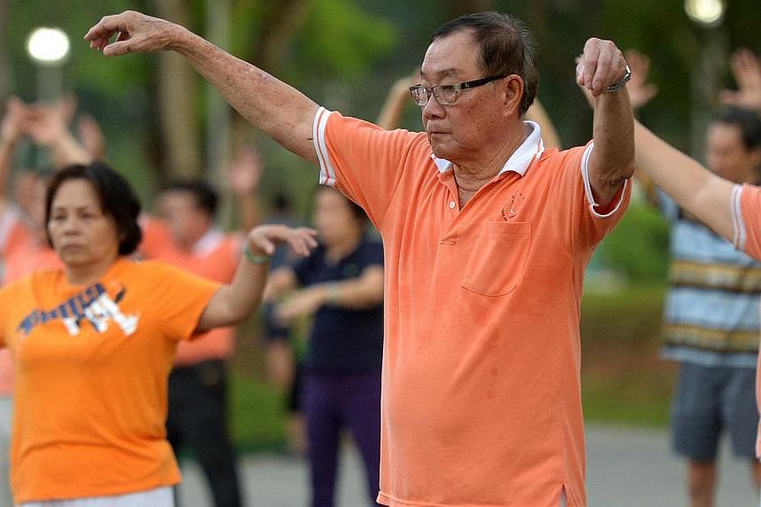 A group of senior citizens exercising at Bishan Park. Reforms that will strengthen CPF in the long run should help younger workers build up their retirement nest egg and guarantee contributing workers the prospect of an adequate retirement, says Assi