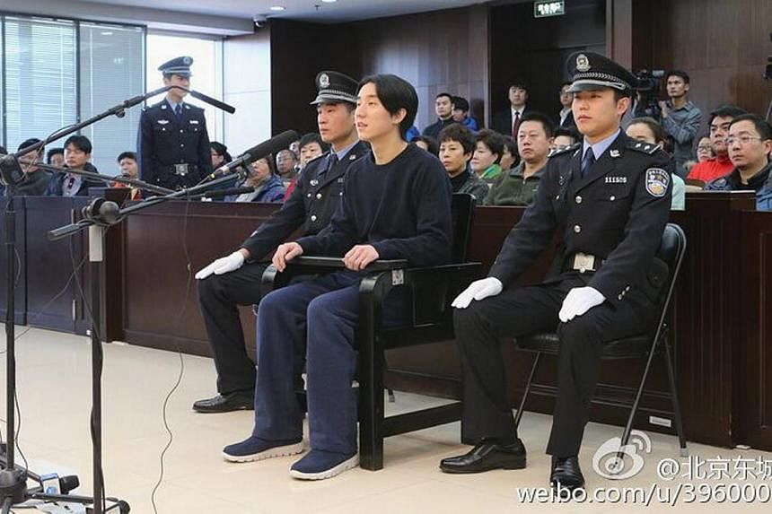 Actor Jaycee Chan attends a trial at a court in Beijing on Jan 9, 2015. Actor Jackie Chan says he and his wife will not be in Beijing to welcome their son Jaycee when he leaves prison. -- PHOTO: REUTERS