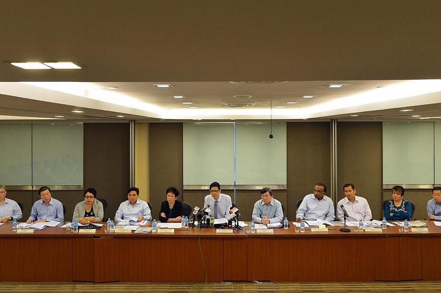 The CPF Advisory Panel holding its press conference to announce recommendations on how to make the CPF system more flexible on Feb 4, 2015, at the Ministry of Manpower. -- ST PHOTO: ALPHONSUS CHERN