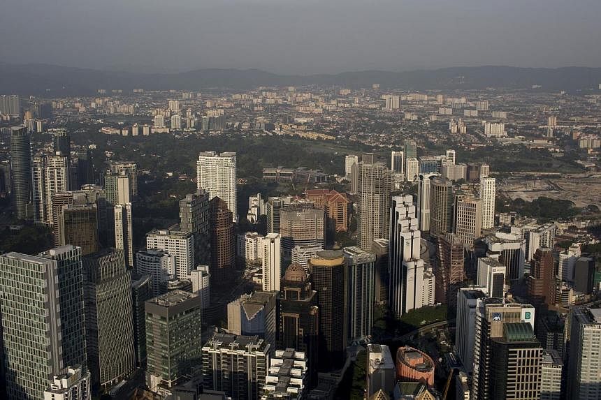 Commercial and residential buildings seen in Kuala Lumpur, Malaysia, on July 20, 2014. -- PHOTO: BLOOMBERG