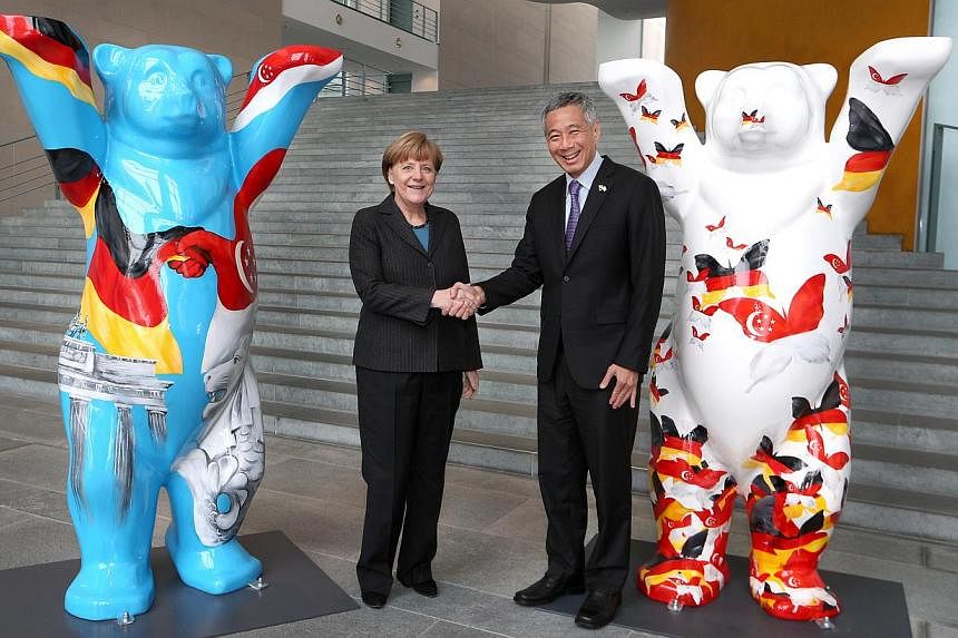 German Federal Chancellor Angela Merkel and Prime Minister Lee Hsien Loong shake hands at the Federal Chancellery in Berlin on Feb 3, 2015.&nbsp;When Prime Minister Lee Hsien Loong met German Chancellor Angela Merkel in Berlin on Tuesday, they posed 