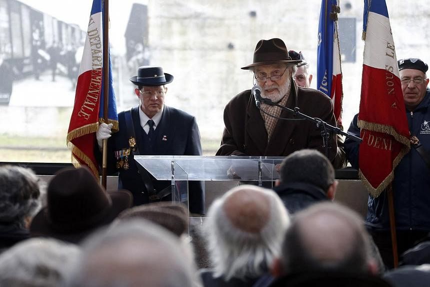 Jewish leaders in France address a crowd during the inauguration of the renovated goods shed of a former train station in Bobigny, north-east of Paris, last week, to mark the international day of Holocaust remembrance and the 70th anniversary of the 