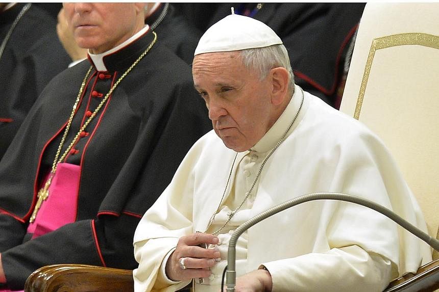 Pope Francis gives his weekly general audience at Paul VI audience hall on Feb 4, 2015, at the Vatican.&nbsp;Pope Francis on Thursday ordered Roman Catholic bishops around the world to fully cooperate with a commission he set up to protect children f