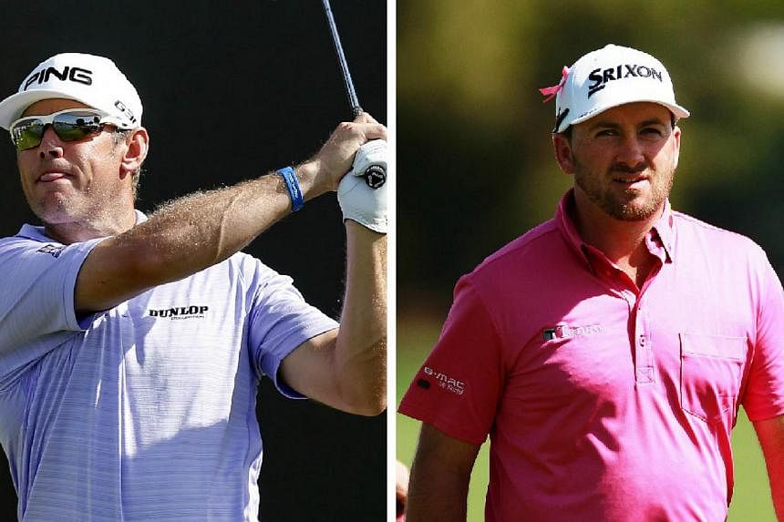Former world No.1 Lee Westwood (left)&nbsp;made a good start to his Malaysian Open title defence on Thursday, Feb 5, 2015, sharing the first-round lead with Ryder Cup team-mate Graeme McDowell (right) on six-under 66. -- PHOTOS:&nbsp;REUTERS, EPA