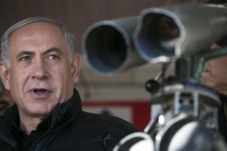 Israel's Prime Minister Benjamin Netanyahu looks on at a military outpost on Feb 4, 2015, during a visit at Mount Hermon which sits in the Israeli occupied Golan Heights on the border between Lebanon, Syria and Israel.&nbsp;An Israeli ambassador and 