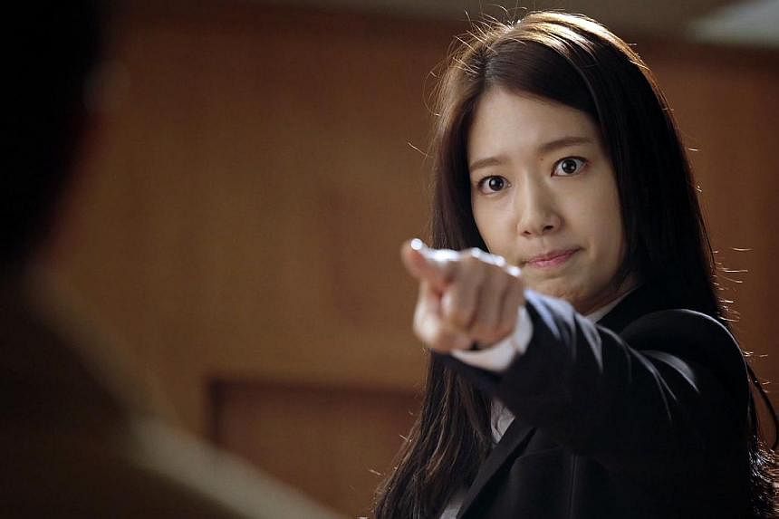 Park Shin Hye plays a zealous TV reporter who cannot lie without hiccupping in K-drama Pinocchio. -- PHOTO: ONE