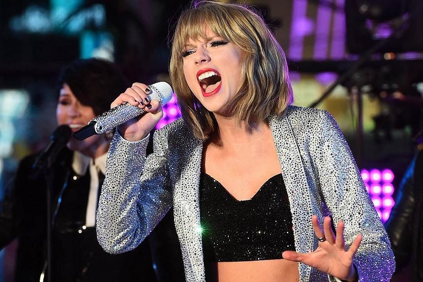 Taylor Swift's 1989 regained the top spot in the weekly Billboard 200 album chart, giving the pop star the distinction of being the second woman in history to have two albums hit No.1 for at least 10 weeks, Billboard says on Wednesday. -- PHOTO: AFP