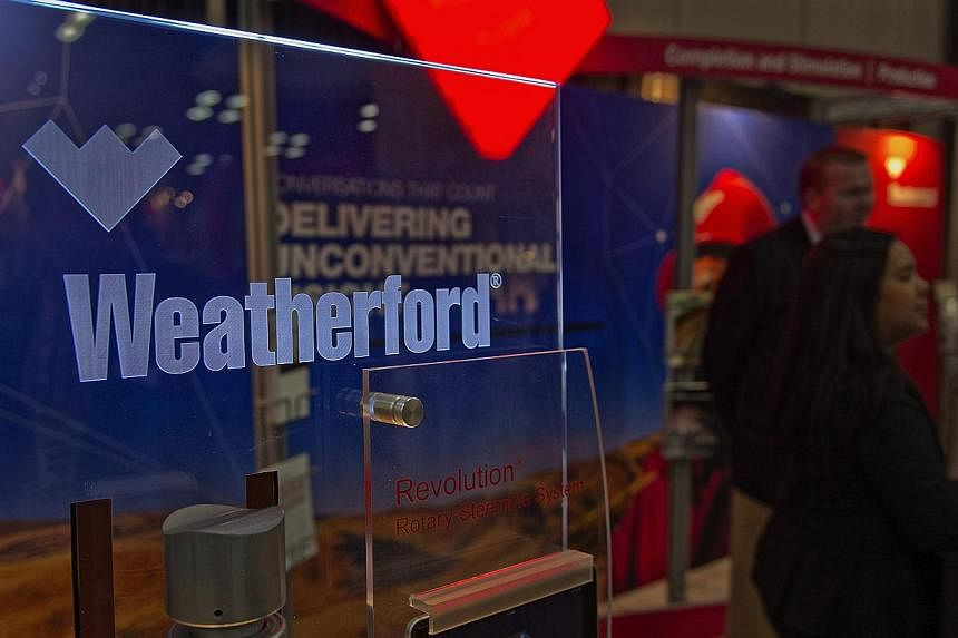 Swiss- based oilfield service company Weatherford International will cut 5,000 positions by the end of the first quarter, after the plunge in crude oil prices. -- PHOTO: BLOOMBERG