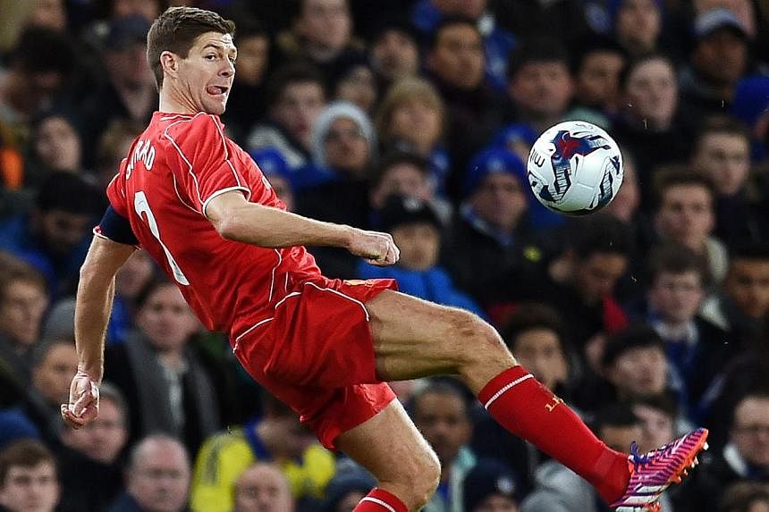 Liverpool captain Steven Gerrard (above) became just the third player in the club's history to make 700 appearances for the Merseysiders when he was included in the starting side to play Bolton Wanderers in a FA Cup fourth-round replay at the Macron 