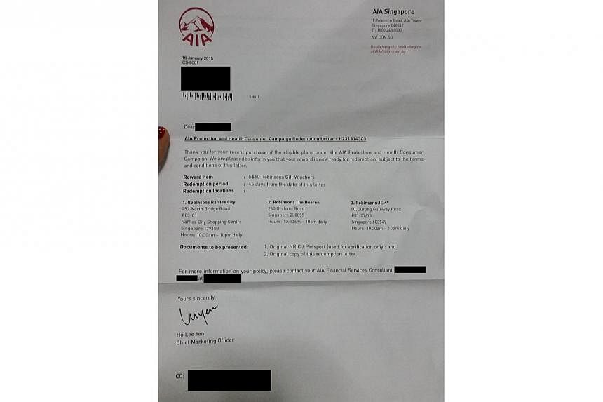A redemption letter for a $50 shopping voucher&nbsp;that was sent to photographer Ng.&nbsp;-- PHOTO: GRACE TAN