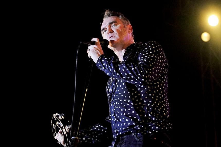 British rock legend Morrissey (above) pulled out of plans for a concert in Iceland because the venue included a restaurant selling meat, his local promoter said Wednesday. -- PHOTO:&nbsp;LAMC PRODUCTIONS