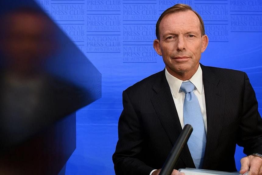 Embattled Australian Prime Minister Tony Abbott will face a vote on his leadership at a party-room meeting next week. -- PHOTO: EPA&nbsp;