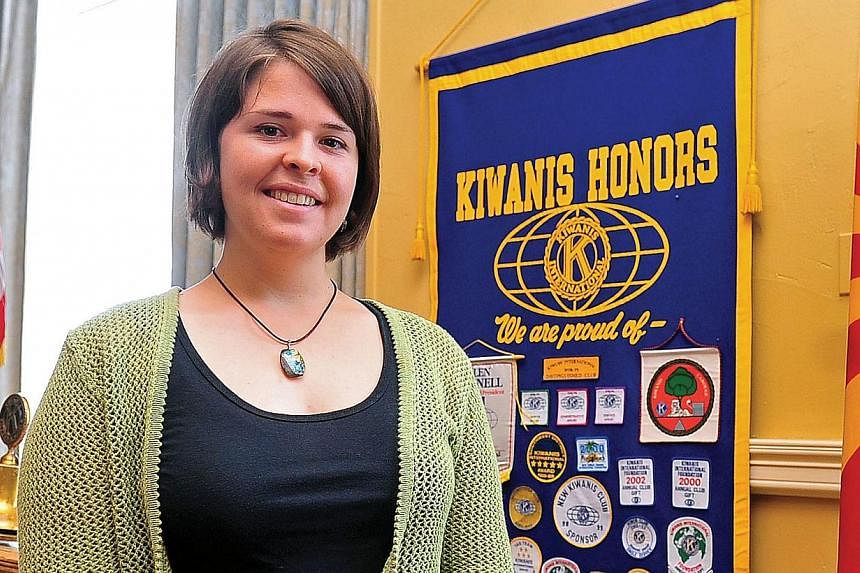 This handout photo courtesy of the Daily Courier in Prescott, Arizona, shows Kayla Mueller in 2013. -- PHOTO: AFP