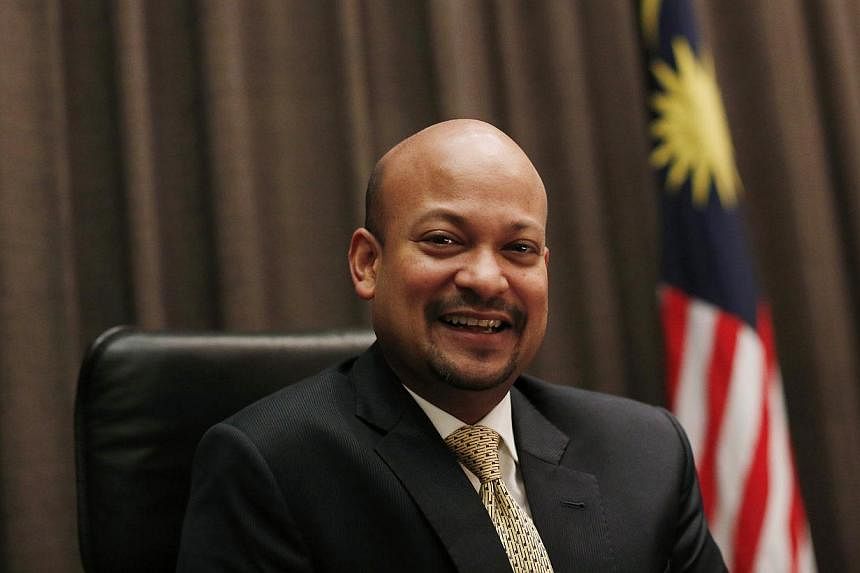 Arul Kanda, newly appointed president and group executive director of Malaysia's state investor 1Malaysia Development Bhd (1MDB), poses for photographs at the head office in Kuala Lumpur on Jan 7, 2015. Troubled state-owned investment fund 1Malaysia 