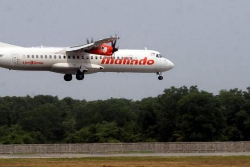 Some 20 passengers on a Malindo Air flight bound for Subang Airport in Kuala Lumpur disembarked from the aircraft minutes before take-off after hearing what they claimed was "a loud argument from the cockpit". -- PHOTO: THE STAR/ASIA NEWS NETWORK&nbs