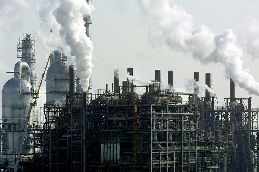 Steam rises from the&nbsp;China Petrochemical Corp (Sinopec Group) oil refinery on the outskirts of Beijing, China on&nbsp;Friday, Jan 17, 2003. China's anti-corruption watchdog said on Saturday that it had uncovered evidence of graft at Sinopec Grou