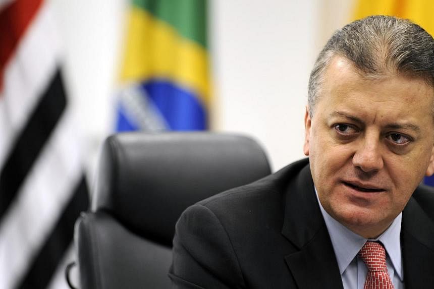Shares in Brazilian oil giant Petrobras plunged Friday as banking executive Aldemir Bendine (above), who is seen as close to President Dilma Rousseff's party, was named the scandal-hit firm's new chief executive. -- PHOTO: BLOOMBERG
