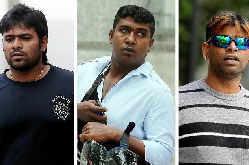 (From left) Ramachandra Chandramohan, Jaya Kumar Krishnasamy and Gunasegaran Rajendran were charged in court on Saturday morning for disorderly behavior and attacking police officers at a Thaipusam event held earlier in the week. -- ST PHOTOS: WONG K
