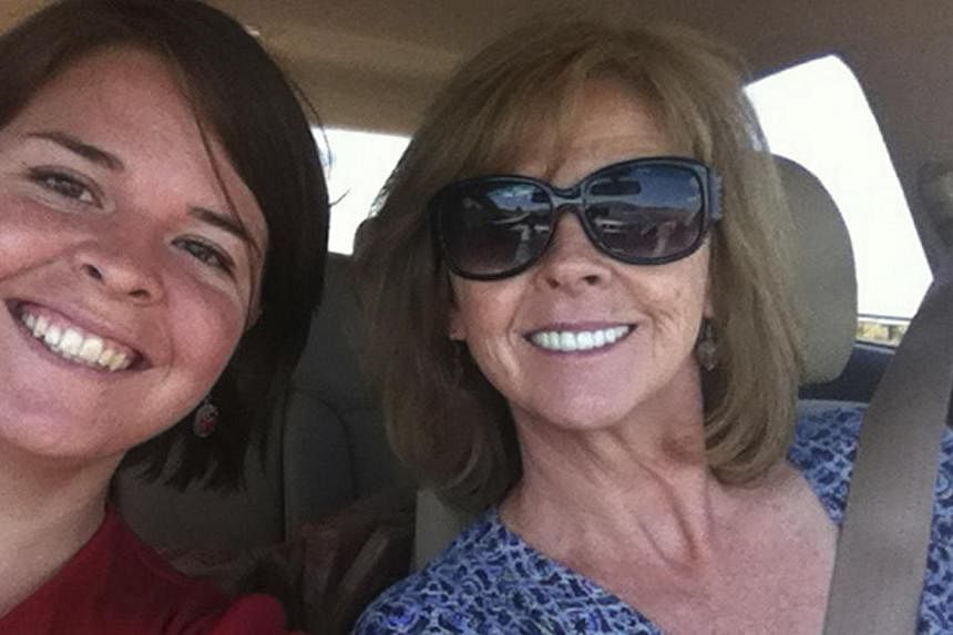 Kayla Mueller (left), 26, an American humanitarian worker from Prescott, Arizona is pictured with her mother Marsha Mueller in this undated handout photo obtained by Reuters Feb 6, 2015. -- PHOTO: REUTERS