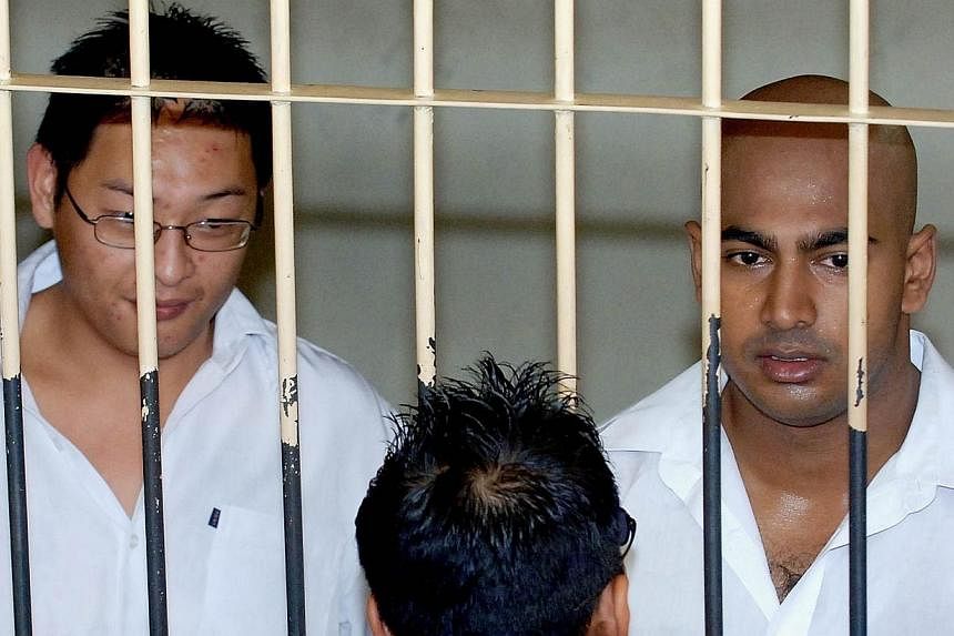 Australian drug traffickers Andrew Chan (left) and Myuran Sukumaran (right) are seen in a holding cell while awaiting court trial in Denpasar, on Bali island in this In this Feb 14, 2006 file photograph.&nbsp;Senior religious leaders in Australia on 