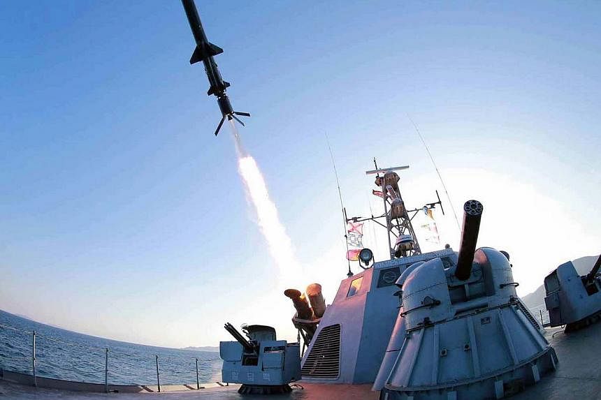 This undated picture released from North Korea's official Korean Central News Agency (KCNA) on Feb 8, 2015, shows the test-firing of a new type of "anti-ship rocket", reportedly on Saturday, Feb 7, to be equipped on Korean People's Army (KPA) naval u