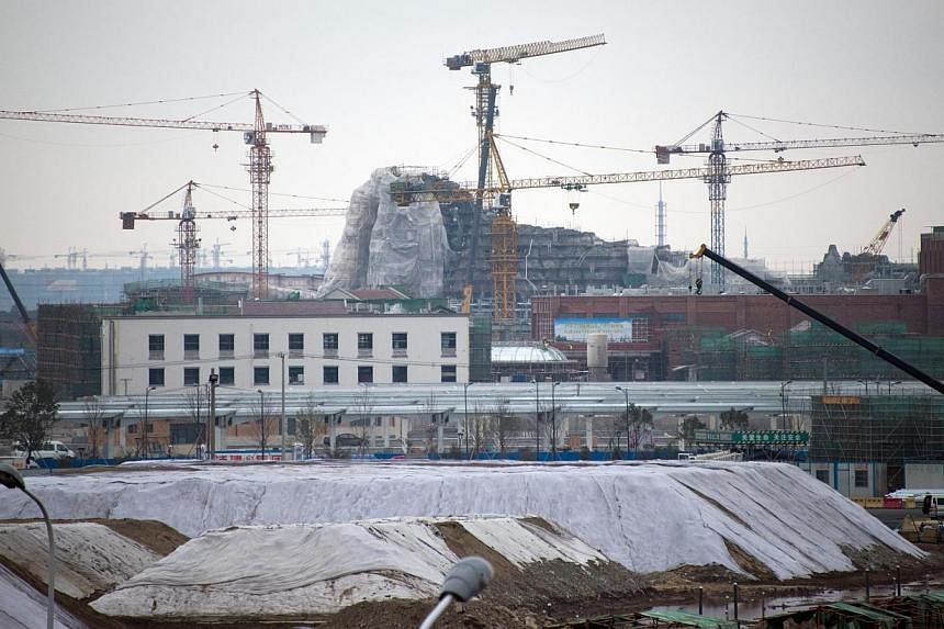 This picture taken on Feb 2, 2015 shows the construction site of the Disney amusement park in Shanghai. The opening of Disney's first mainland China theme park has been pushed back to 2016. -- PHOTO: AFP