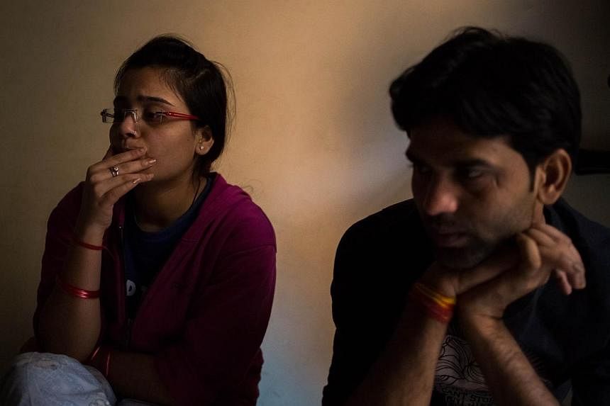 Indian couple Ms Vandana, 22, and Mr Dilip, 28, describe how they met and the pressure they faced from their relatives after deciding to marry during an interview with AFP at one of seven shelters for coupes who have left their homes to marry against