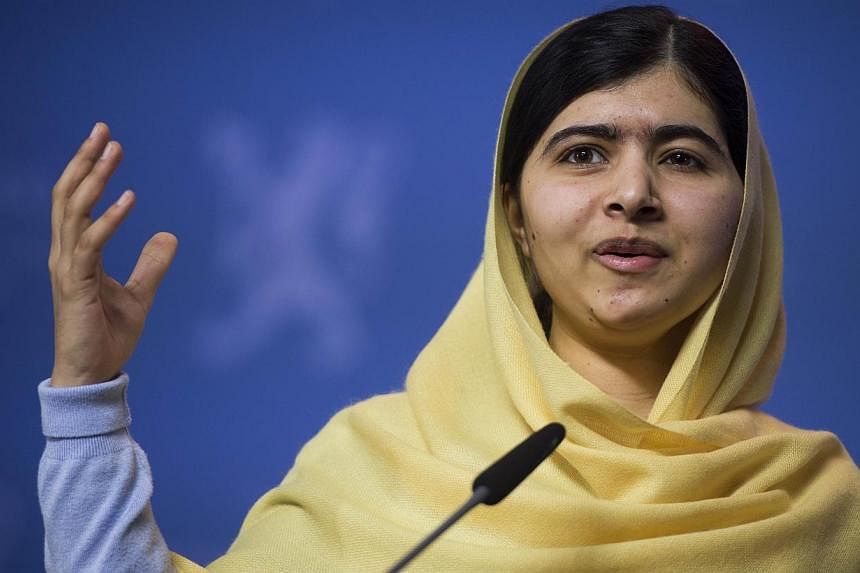 Nobel Peace Prize laureate Malala Yousafzai speaks at a joint press conference in Oslo on Dec 11, 2014. She calls for global support to help release more than 200 Nigerian schoolgirls kidnapped by Boko Haram, as they marked 300 days as hostages. -- P