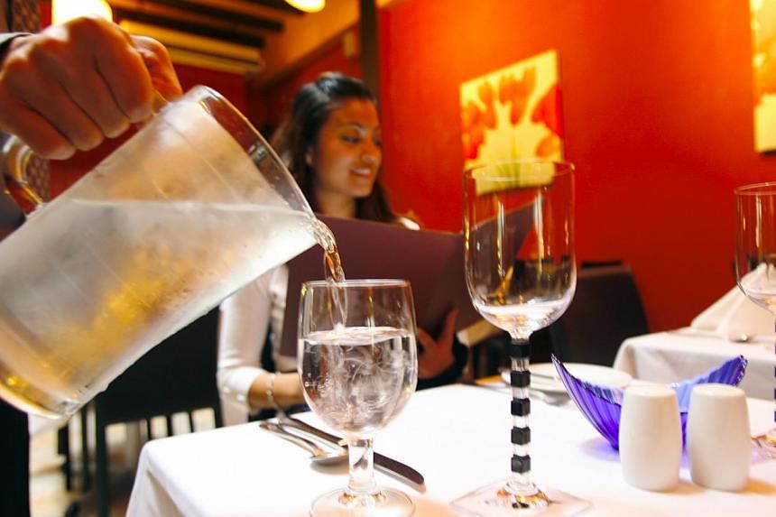 Over 85 per cent of 1,700 people who took part in a Straits Times online poll said they would not pay for tap water while eating out at a restaurant. -- ST FILE PHOTO&nbsp;