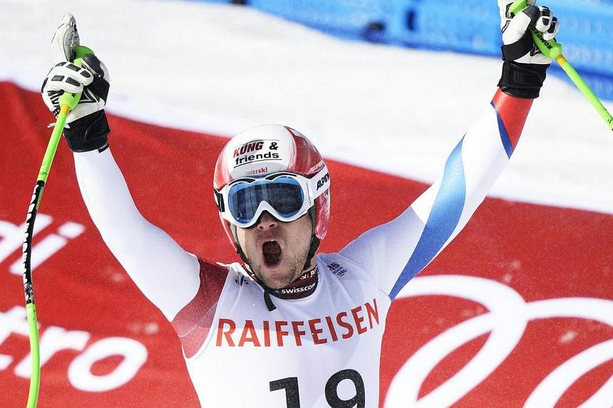 Patrick Kueng of Switzerland reacts in the finish area during the Men's Downhill race at the FIS Alpine World Ski Championships in Beaver Creek, Colorado, Feb 7 2015. -- PHOTO: EPA