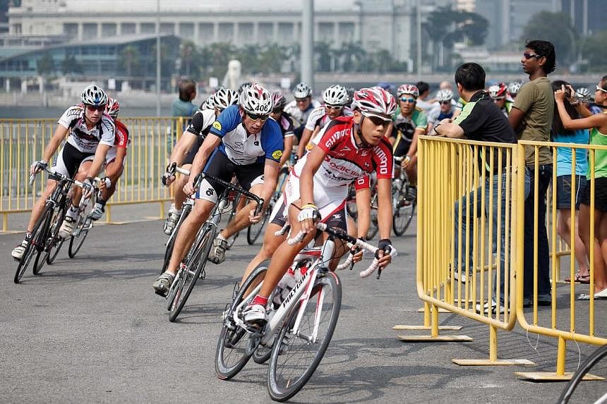 Cyclists at the OCBC Cycle event in 2014. This year, a total of 400 subscribers of The Straits Times All-in-One package will enjoy priority registration for The Straits Times Ride (about 23km) from March 4. -- PHOTO: OCBC BANK&nbsp;