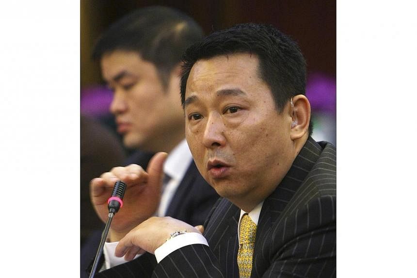 Liu Han, former chairman of Hanlong Mining, speaks during a conference in Mianyang, Sichuan province, in this March 21, 2008 file photo. The former mining tycoon, who is&nbsp;connected to the eldest son of retired domestic security chief Zhou Yongkan