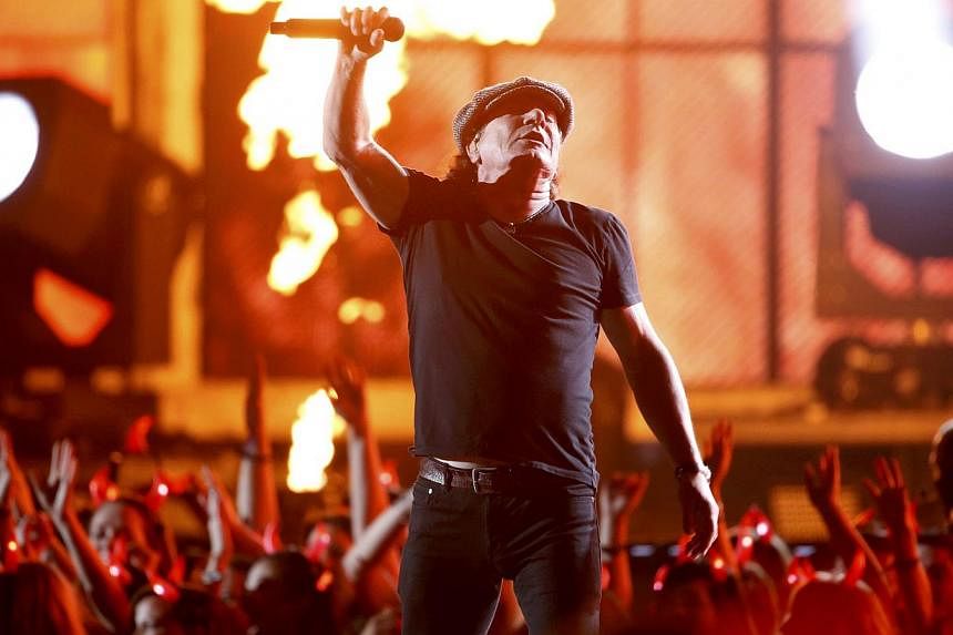 Brian Johnson of AC/DC performs a medley of songs to open the show at the 57th annual Grammy Awards in Los Angeles, California on Feb 8, 2015. -- PHOTO: REUTERS