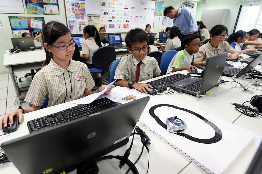 Wellington Primary School students learning how to code in the computer lab.&nbsp;More than 19,000 pupils and students, from primary to tertiary levels, have benefited from an initiative launched in April 2014 that aimed to spark their interest in co