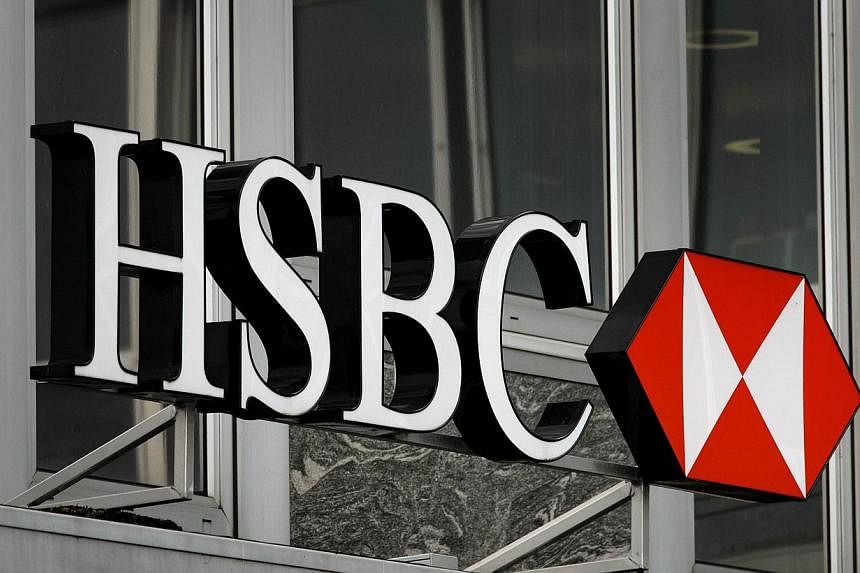 A file picture shows a sign of HSBC in the centre of Geneva, swiss subsidiary of British bank HSBC. -- PHOTO: AFP