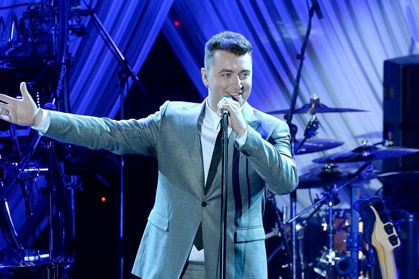 Recording artist Sam Smith performs onstage during the Pre-Grammy Gala and Salute To Industry Icons honoring Martin Bandier at The Beverly Hilton Hotel on Saturday in Beverly Hills, California. -- PHOTO: AFP