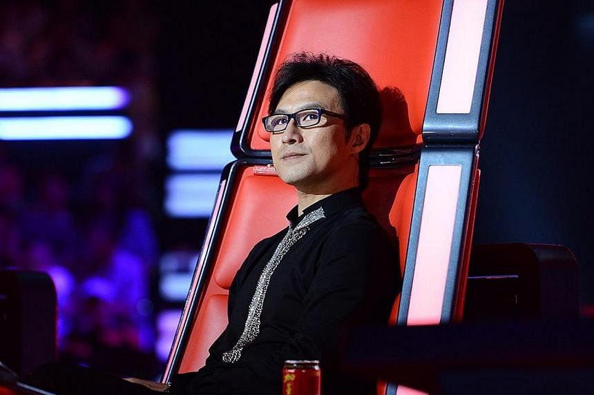 Wang Feng as a judge&nbsp;during the third season of The Voice Of China. The rocker proposed to actress Zhang Ziyi on Feb 7, 2015. -- PHOTO:&nbsp;MEDIACORP