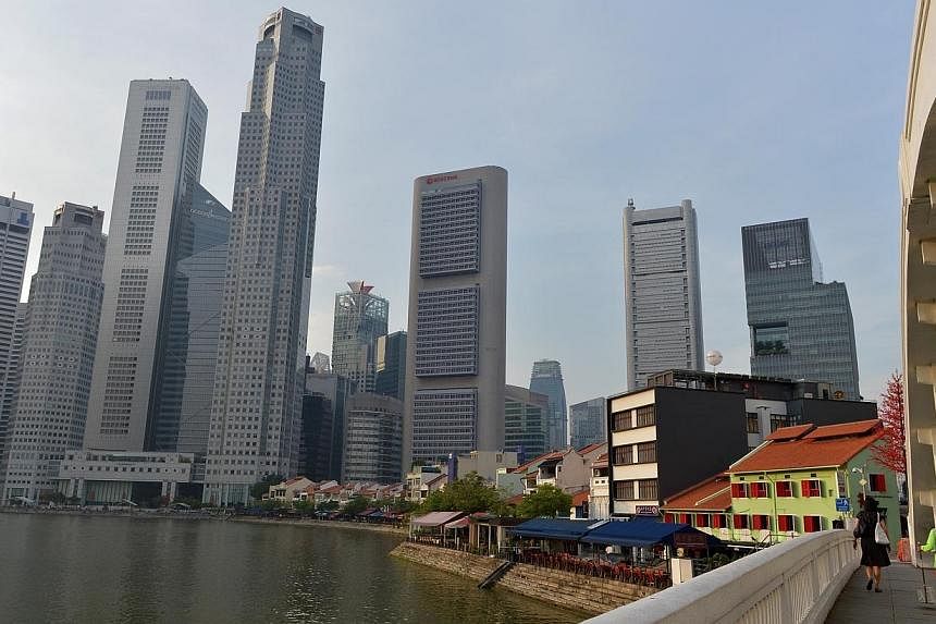 Singapore Central Business District (CBD) rents rose over 14 per cent last year, the strongest across Asia Pacific, said a JLL report on Thursday. -- PHOTO: ST FILE