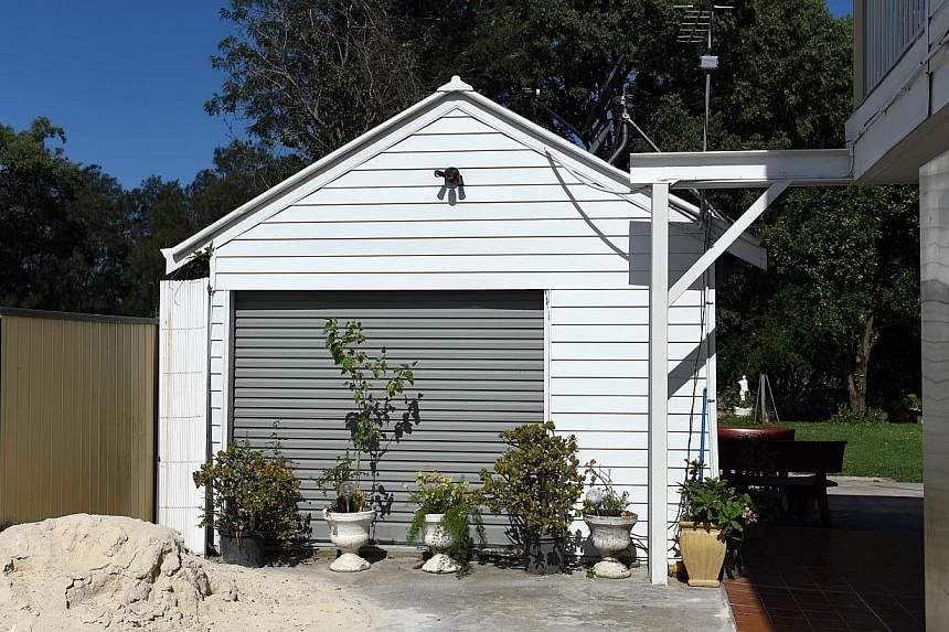 A general view shows a converted garage at the rear of the property in the Fairfield district of Sydney on Feb 11, 2015, where Omar Al-Kutobi, 24, and Mohammad Kiad, 25, were arrested in a raid on the property by the Joint Counter Terrorism Taskforce