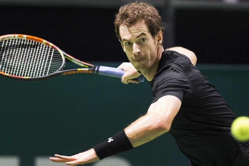 British Andy Murray returns the ball to French Nicolas Mahut during their first round match of the ABN AMRO World Tennis Tournament in Rotterdam, The Netherlands, on Feb 11, 2015. -- PHOTO: EPA