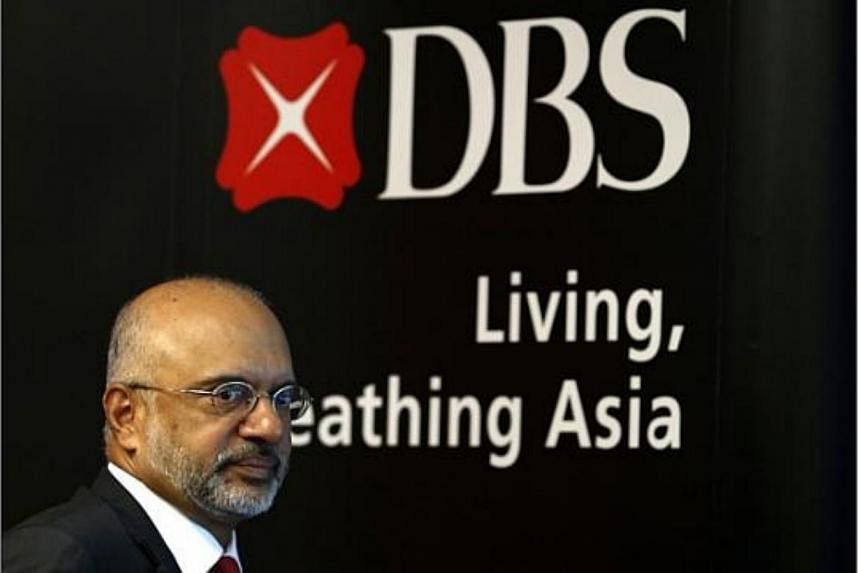 DBS chief executive Piyush Gupta announced a $1,000 cash gift to each of the bank's 18,000 employees on Wednesday, as part of celebrations marking Singapore's 50th birthday. -- PHOTO: REUTERS